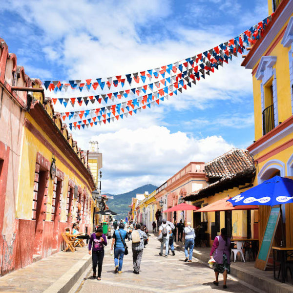 Mexico travel tips; A colourful pedestrianised street with bunting in San Cristóbal de las Casas
