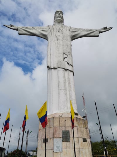 A white statue, Christ the Redeemer, one of the best things to see in Cali, Colombia